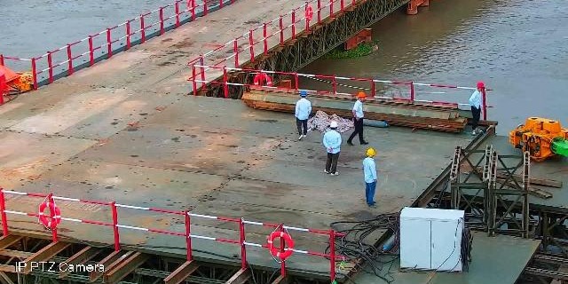 传统方案检测结果:仅检出部分工人,置信度低